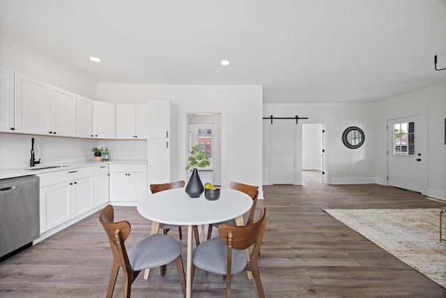 2806 N Chamberlain Ave, Chattanooga, TN 37406 - dining space with a barn door, recessed lighting, and dark wood finished floors