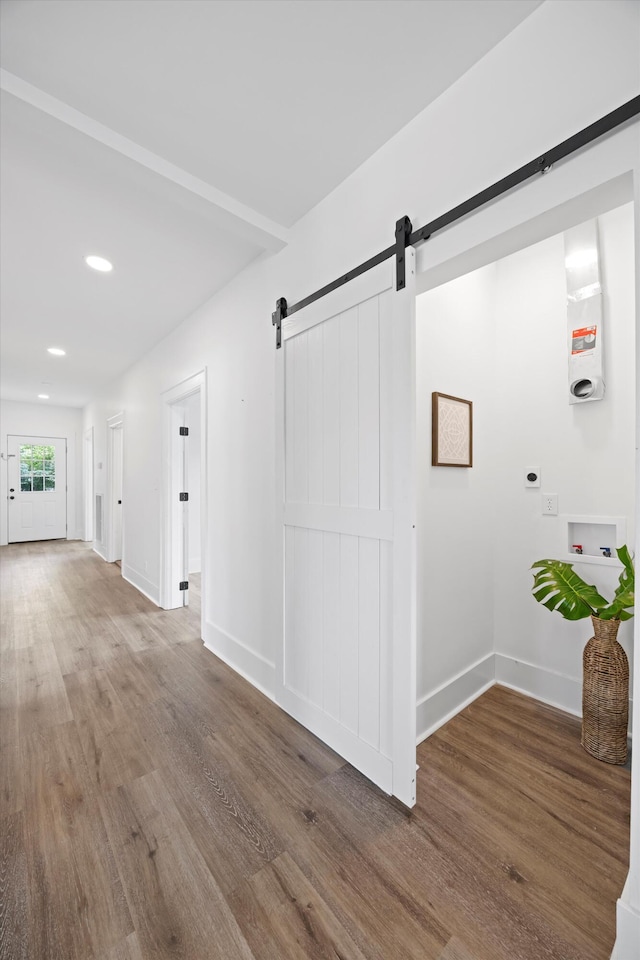 2806 N Chamberlain Ave, Chattanooga, TN 37406 - hallway with a barn door, wood finished floors, and recessed lighting