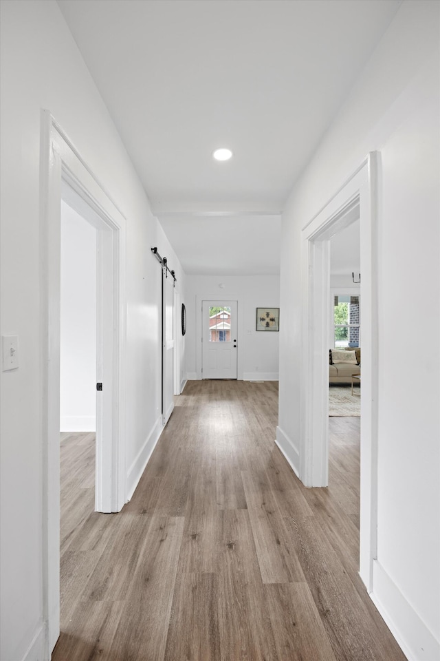 2806 N Chamberlain Ave, Chattanooga, TN 37406 - hallway featuring a barn door, wood finished floors, and recessed lighting