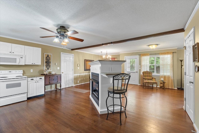 8719 Glenaire Dr, Chattanooga, TN 37416 - kitchen featuring white appliances, a textured ceiling, crown molding, ceiling fan, and white cabinets
