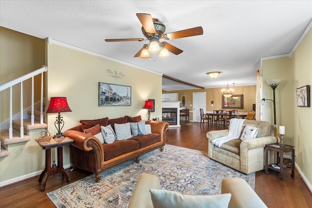 8719 Glenaire Dr, Chattanooga, TN 37416 - living room with wood finished floors, crown molding, ceiling fan, stairs, and baseboards