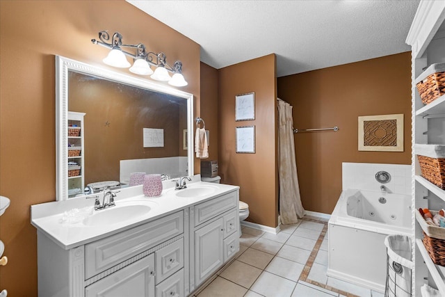 8719 Glenaire Dr, Chattanooga, TN 37416 - full bath featuring tile patterned flooring, toilet, a whirlpool tub, double vanity, and baseboards