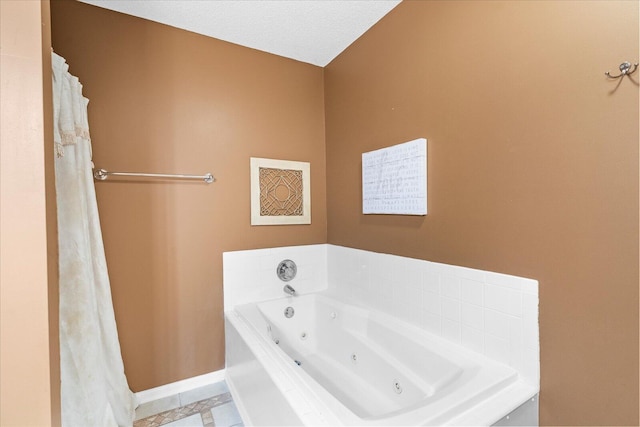 8719 Glenaire Dr, Chattanooga, TN 37416 - full bathroom featuring a tub with jets and baseboards
