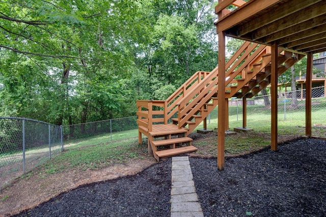 8719 Glenaire Dr, Chattanooga, TN 37416 - fenced backyard with stairs and view of wooded area