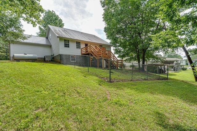 8719 Glenaire Dr, Chattanooga, TN 37416 - rear view of house with a deck, metal roof, and stairway
