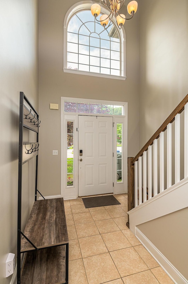 6721 Brianna Way, Chattanooga, TN 37421 - tiled entrance foyer with a high ceiling, a chandelier, and baseboards