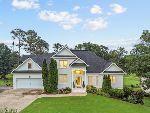 649 Wisley Way, Ringgold, GA 30736 - view of front facade featuring a front lawn, concrete driveway, a shingled roof, and an attached garage