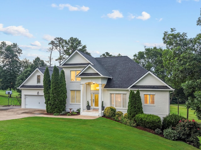 649 Wisley Way, Ringgold, GA 30736 - view of front of house with a front yard, concrete driveway, a shingled roof, and brick siding