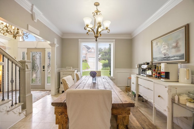 649 Wisley Way, Ringgold, GA 30736 - dining space with a chandelier, crown molding, stairs, light tile patterned floors, and a wainscoted wall