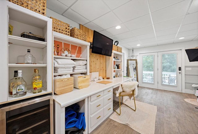 649 Wisley Way, Ringgold, GA 30736 - office featuring wine cooler, a drop ceiling, light wood finished floors, and recessed lighting