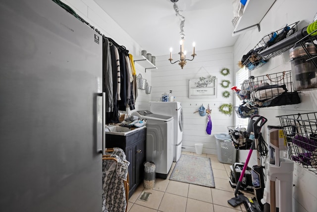 649 Wisley Way, Ringgold, GA 30736 - laundry room featuring a chandelier, light tile patterned floors, and separate washer and dryer