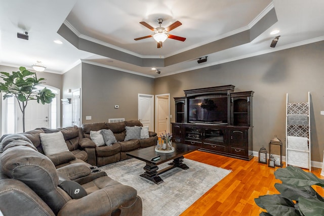 9923 Sims Harris Rd, Ooltewah, TN 37363 - living area with ceiling fan, a tray ceiling, wood finished floors, crown molding, and recessed lighting