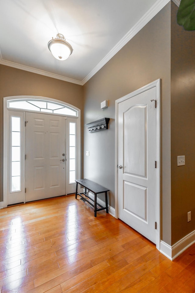 9923 Sims Harris Rd, Ooltewah, TN 37363 - entryway with crown molding, light wood-type flooring, and baseboards