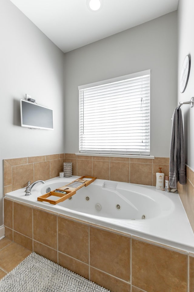 9923 Sims Harris Rd, Ooltewah, TN 37363 - bathroom featuring a whirlpool tub and tile patterned flooring