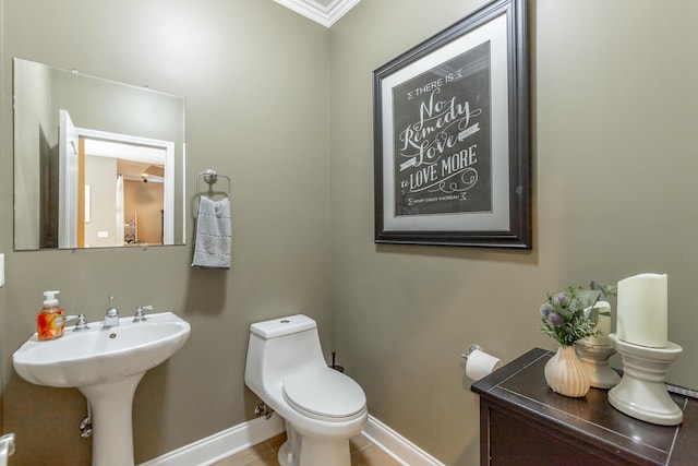 9923 Sims Harris Rd, Ooltewah, TN 37363 - half bath featuring baseboards, toilet, and ornamental molding