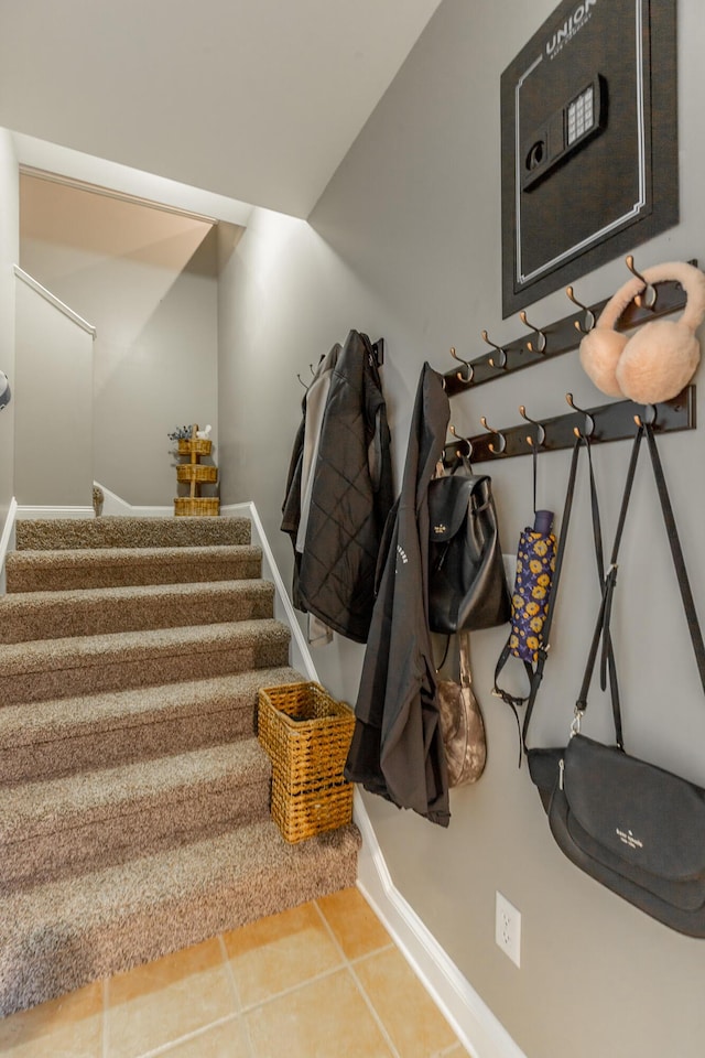 9923 Sims Harris Rd, Ooltewah, TN 37363 - staircase featuring baseboards and tile patterned floors