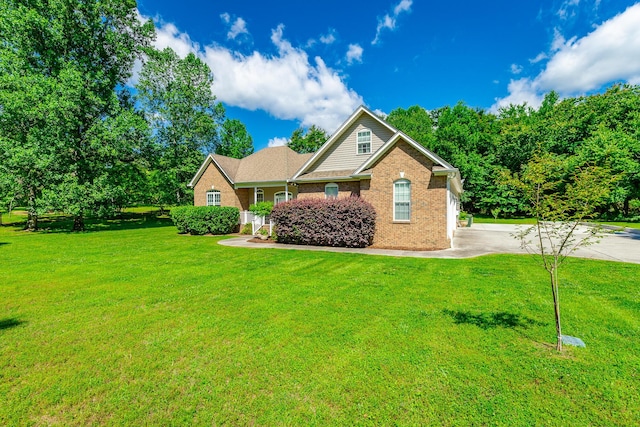 9923 Sims Harris Rd, Ooltewah, TN 37363 - view of front of property featuring brick siding and a front yard