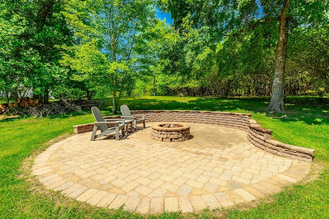 9923 Sims Harris Rd, Ooltewah, TN 37363 - view of patio with an outdoor fire pit