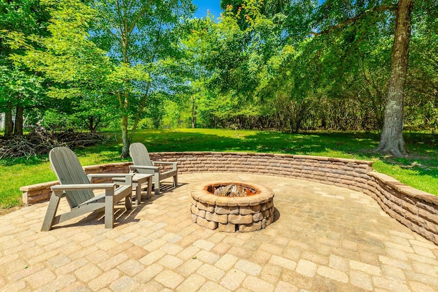 9923 Sims Harris Rd, Ooltewah, TN 37363 - view of patio featuring a fire pit