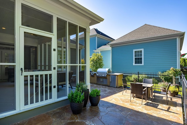 2027 Holden Farm Pl Unit 622, Ooltewah, TN 37363 - view of patio featuring outdoor dining area and a sunroom