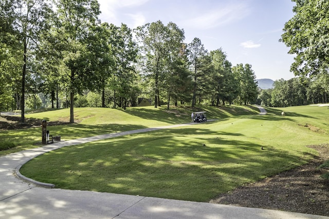 2027 Holden Farm Pl Unit 622, Ooltewah, TN 37363 - surrounding community with view of scattered trees, golf course view, and a lawn