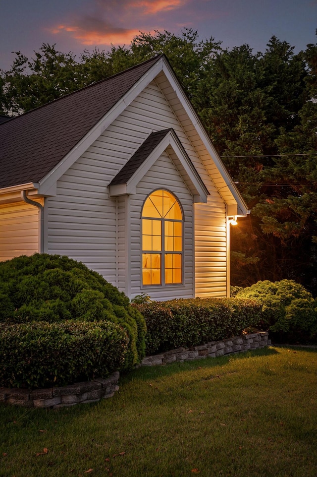 20 Debbie Ln, Ringgold, GA 30736 - property exterior at dusk featuring a yard and a shingled roof