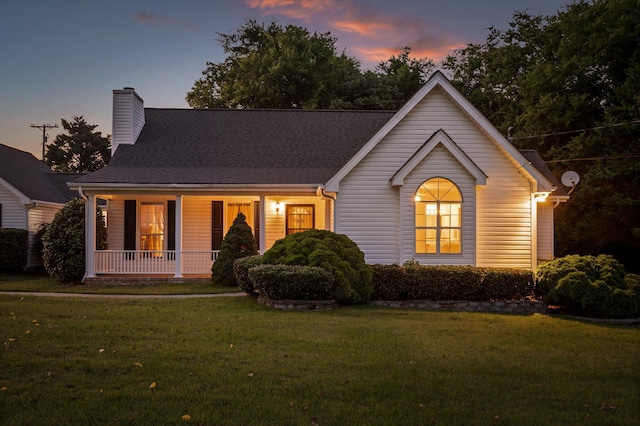 20 Debbie Ln, Ringgold, GA 30736 - view of front of house with a porch, a yard, and a chimney