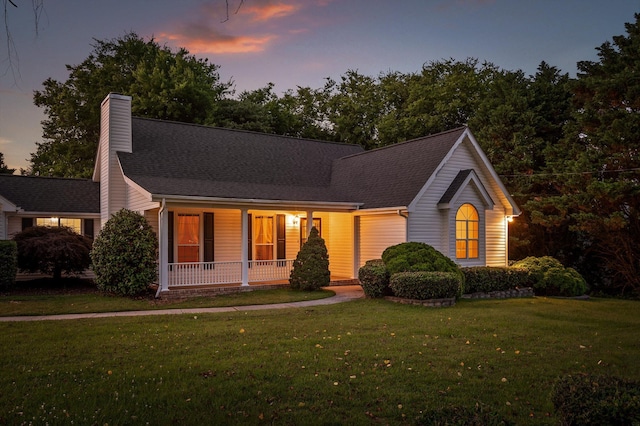 20 Debbie Ln, Ringgold, GA 30736 - view of front of home featuring a porch, a yard, and a chimney