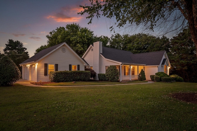 20 Debbie Ln, Ringgold, GA 30736 - view of front of house with a lawn, a chimney, and an attached garage