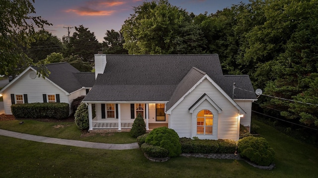 20 Debbie Ln, Ringgold, GA 30736 - traditional-style home with covered porch, a front yard, a chimney, and a shingled roof