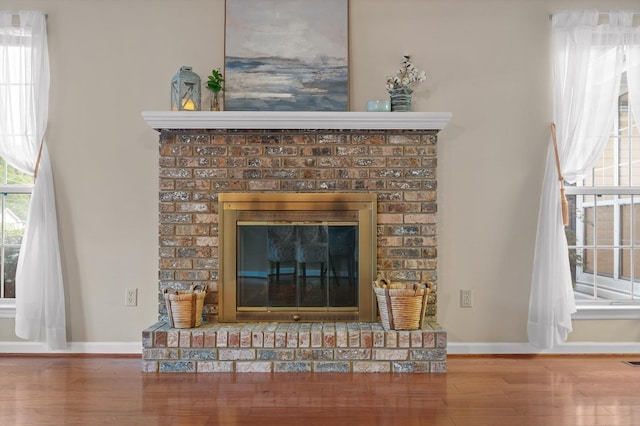 20 Debbie Ln, Ringgold, GA 30736 - detailed view of wood finished floors and a brick fireplace
