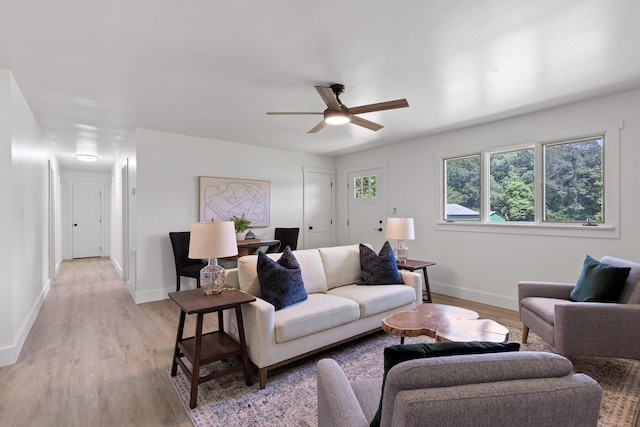 1795 Dowdy Rd, Cleveland, TN 37323 - living area featuring light wood-style flooring, baseboards, and ceiling fan