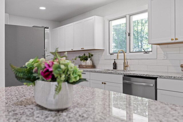 1795 Dowdy Rd, Cleveland, TN 37323 - kitchen with stainless steel appliances, a sink, white cabinetry, tasteful backsplash, and recessed lighting