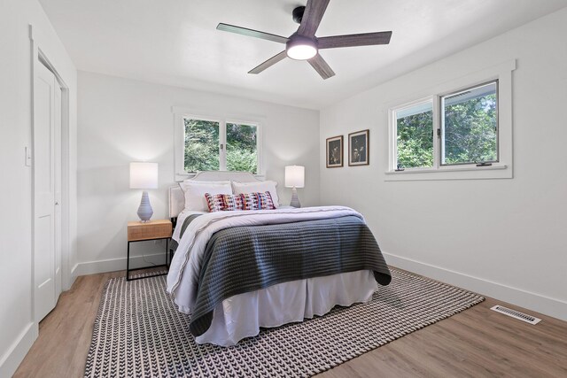1795 Dowdy Rd, Cleveland, TN 37323 - bedroom with light wood-style floors, baseboards, and a ceiling fan