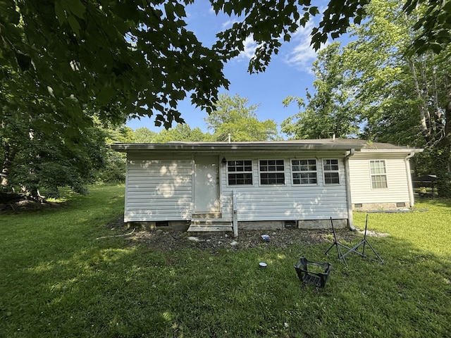 155 Red Rd, Chatsworth, GA 30705 - back of property with crawl space, a yard, and entry steps