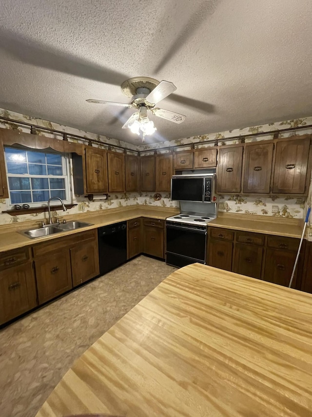 150 Royal Oaks Dr NE, Cleveland, TN 37323 - kitchen with black appliances, a sink, a ceiling fan, and a textured ceiling