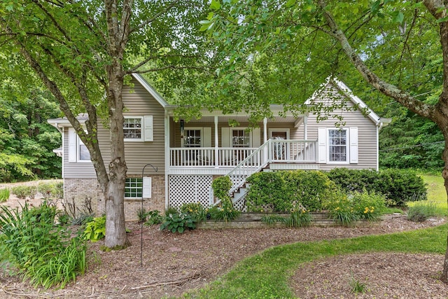 5726 Browntown Rd, Chattanooga, TN 37415 - view of front of home featuring covered porch, stairs, and brick siding
