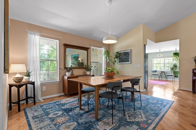 5726 Browntown Rd, Chattanooga, TN 37415 - dining room with baseboards, vaulted ceiling, and light wood-style flooring