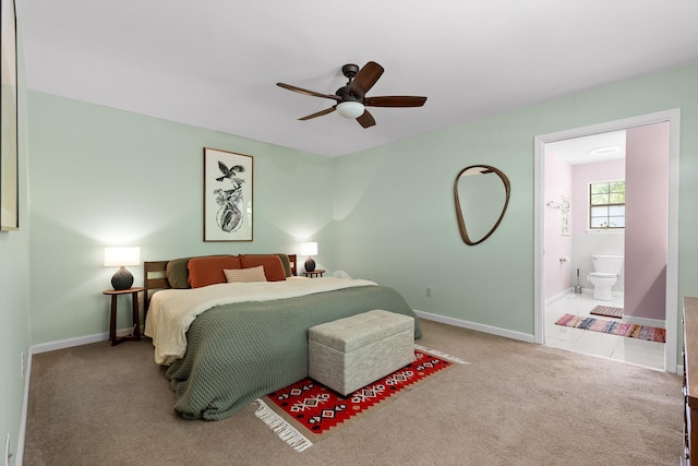 5726 Browntown Rd, Chattanooga, TN 37415 - carpeted bedroom featuring connected bathroom, baseboards, and a ceiling fan