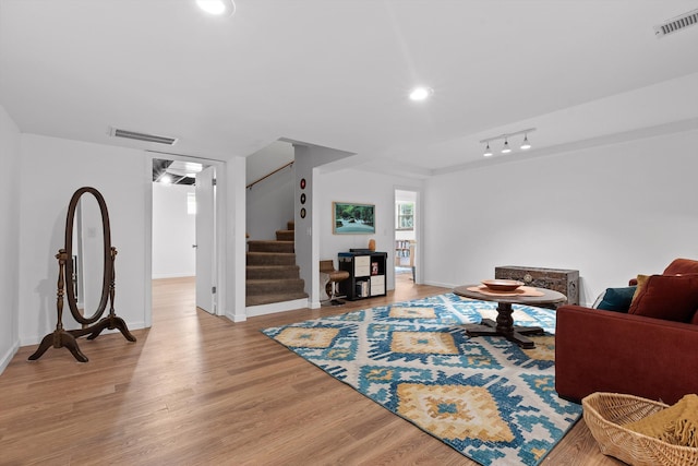 5726 Browntown Rd, Chattanooga, TN 37415 - living area with stairway, light wood finished floors, baseboards, and recessed lighting