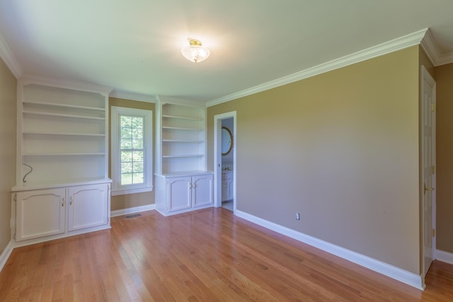 7900 Ooltewah Georgetown Rd, Ooltewah, TN 37363 - empty room with baseboards, light wood-style floors, and crown molding