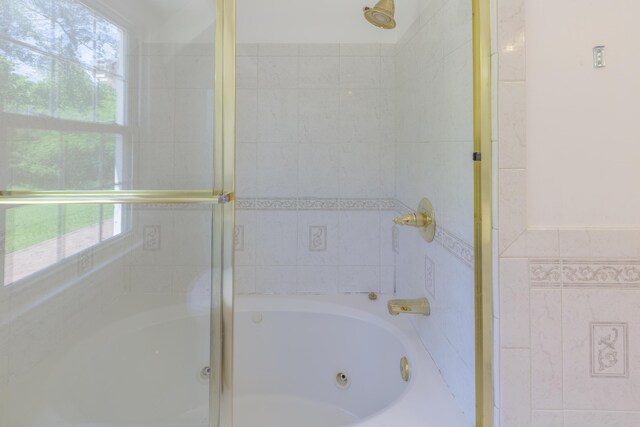 7900 Ooltewah Georgetown Rd, Ooltewah, TN 37363 - full bathroom featuring tile walls