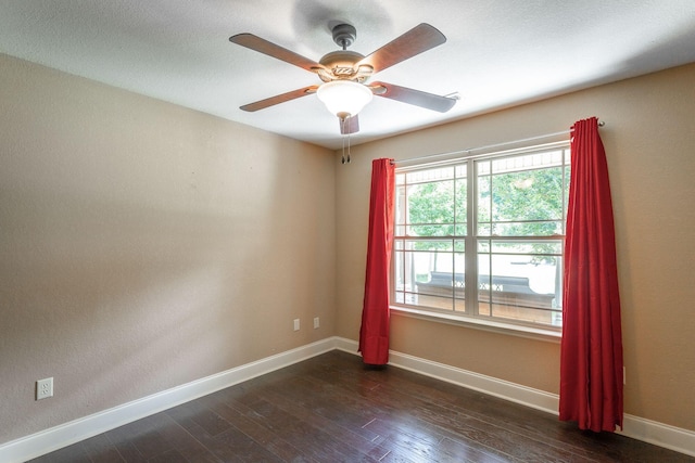 169 Southern Dr, Ringgold, GA 30736 - spare room with baseboards, dark wood-style floors, and a ceiling fan
