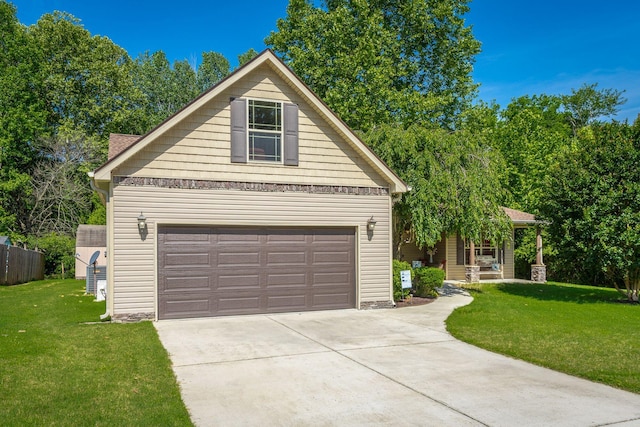 169 Southern Dr, Ringgold, GA 30736 - view of front of property with driveway, a garage, and a front lawn