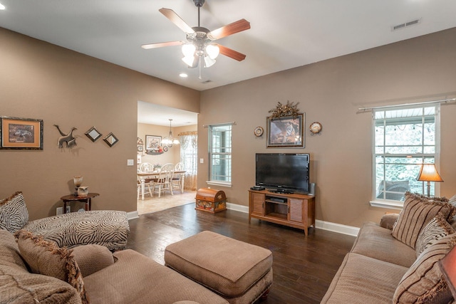 169 Southern Dr, Ringgold, GA 30736 - living room with dark wood-style floors, baseboards, recessed lighting, ceiling fan, and a chandelier