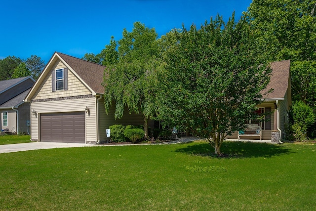 169 Southern Dr, Ringgold, GA 30736 - view of front of house with a front yard, concrete driveway, a garage, and a shingled roof