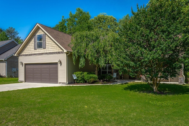 169 Southern Dr, Ringgold, GA 30736 - view of front of house with concrete driveway, a garage, a front lawn, and roof with shingles