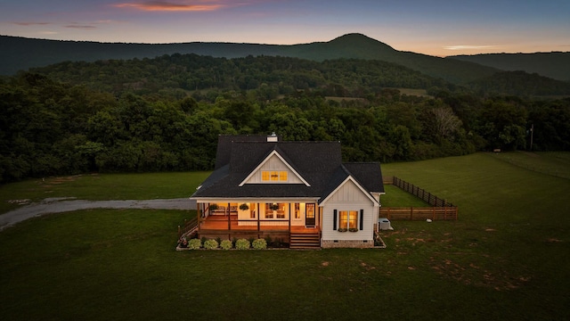 229 Blue Bird Way, Dunlap, TN 37327 - exterior space with crawl space, a forest view, covered porch, a chimney, and board and batten siding