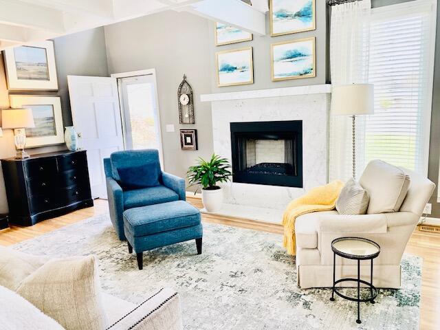 805 W Waugh St, Dalton, GA 30720 - living room featuring wood finished floors and a fireplace