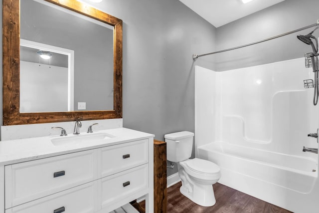 603 Browns Ferry Rd, Chattanooga, TN 37419 - bathroom with toilet, shower / bathtub combination, vanity, and wood finished floors